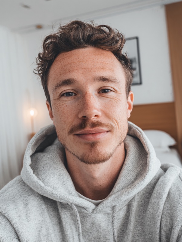 An AI-generated portrait photo of a model — the quality benchmark for 2026 ecommerce lifestyle shots